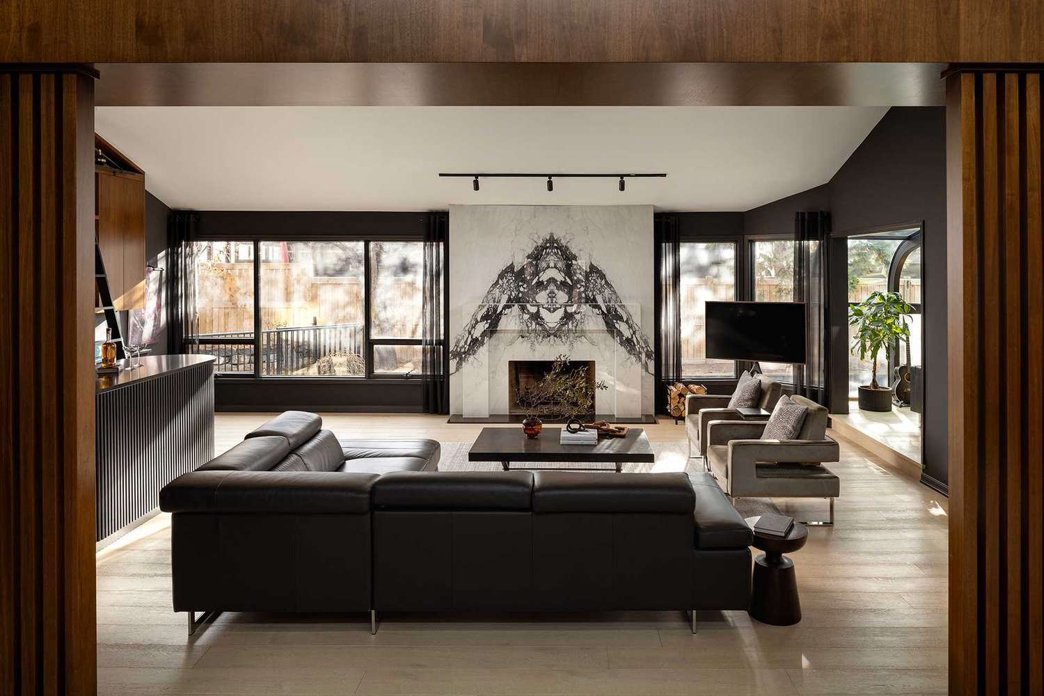 41 Living Room Ideas With Black Couches, From Neutral to Bold