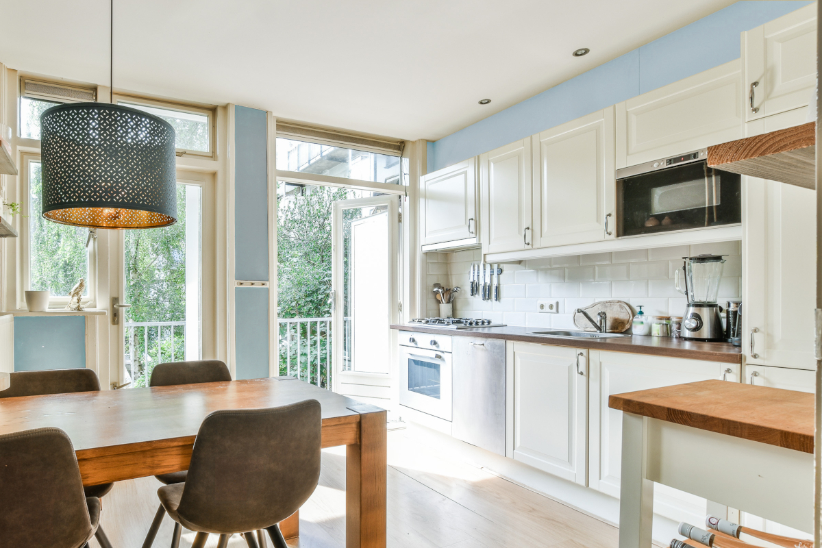 9 Paint Colors for Small Kitchens That Open Up the Room