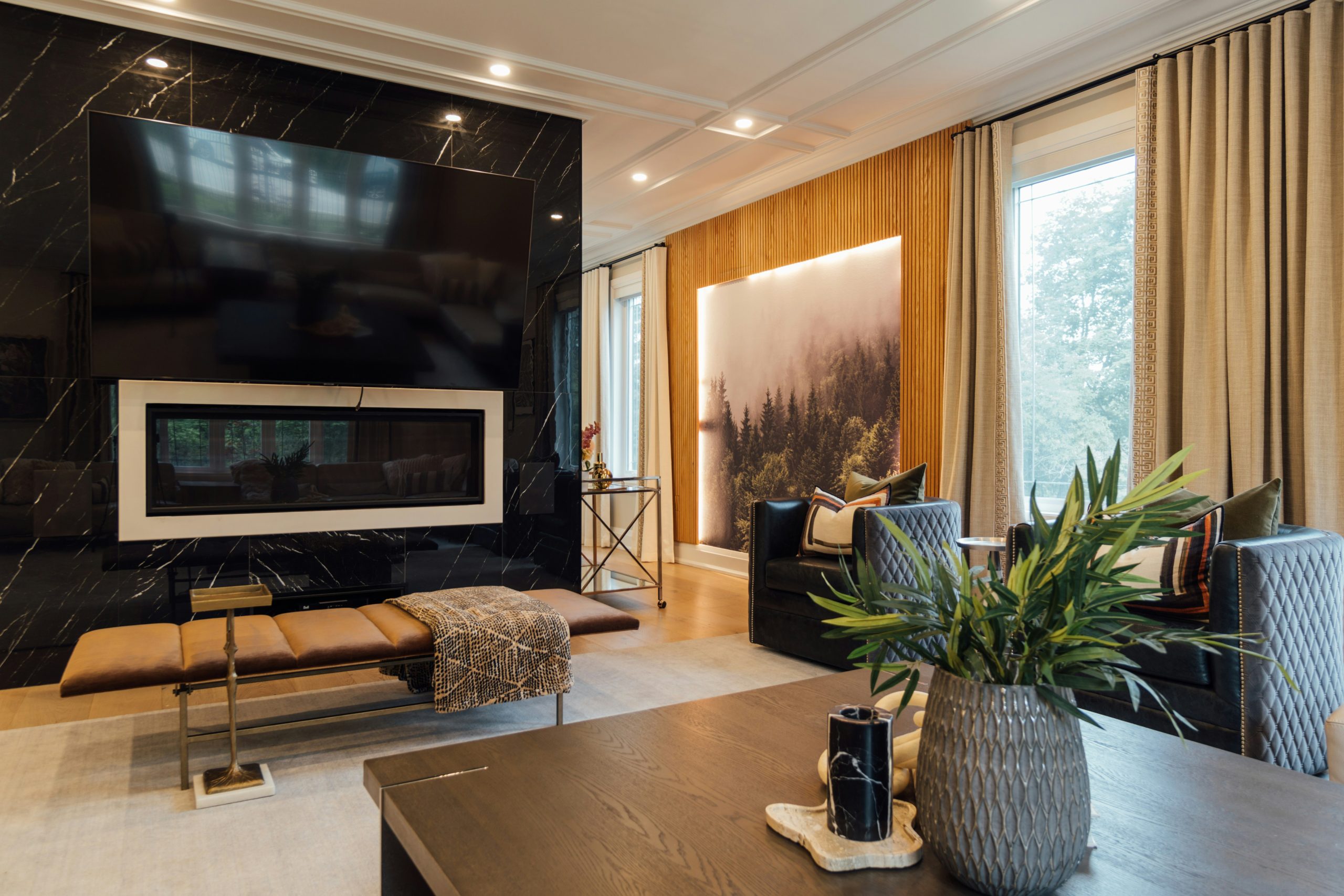 a living room with a couch a table and a television