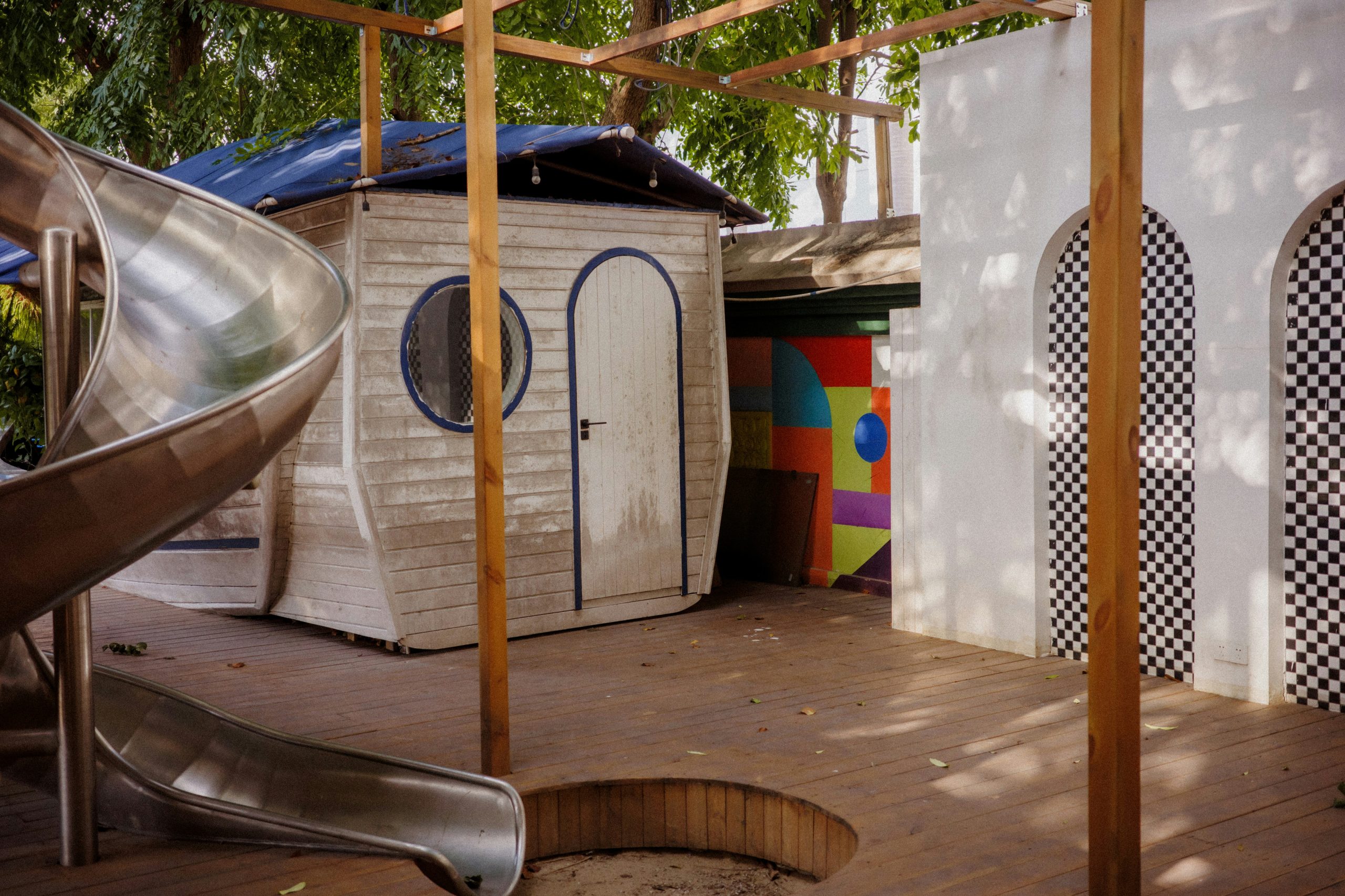 Children's playground with slides and playhouses