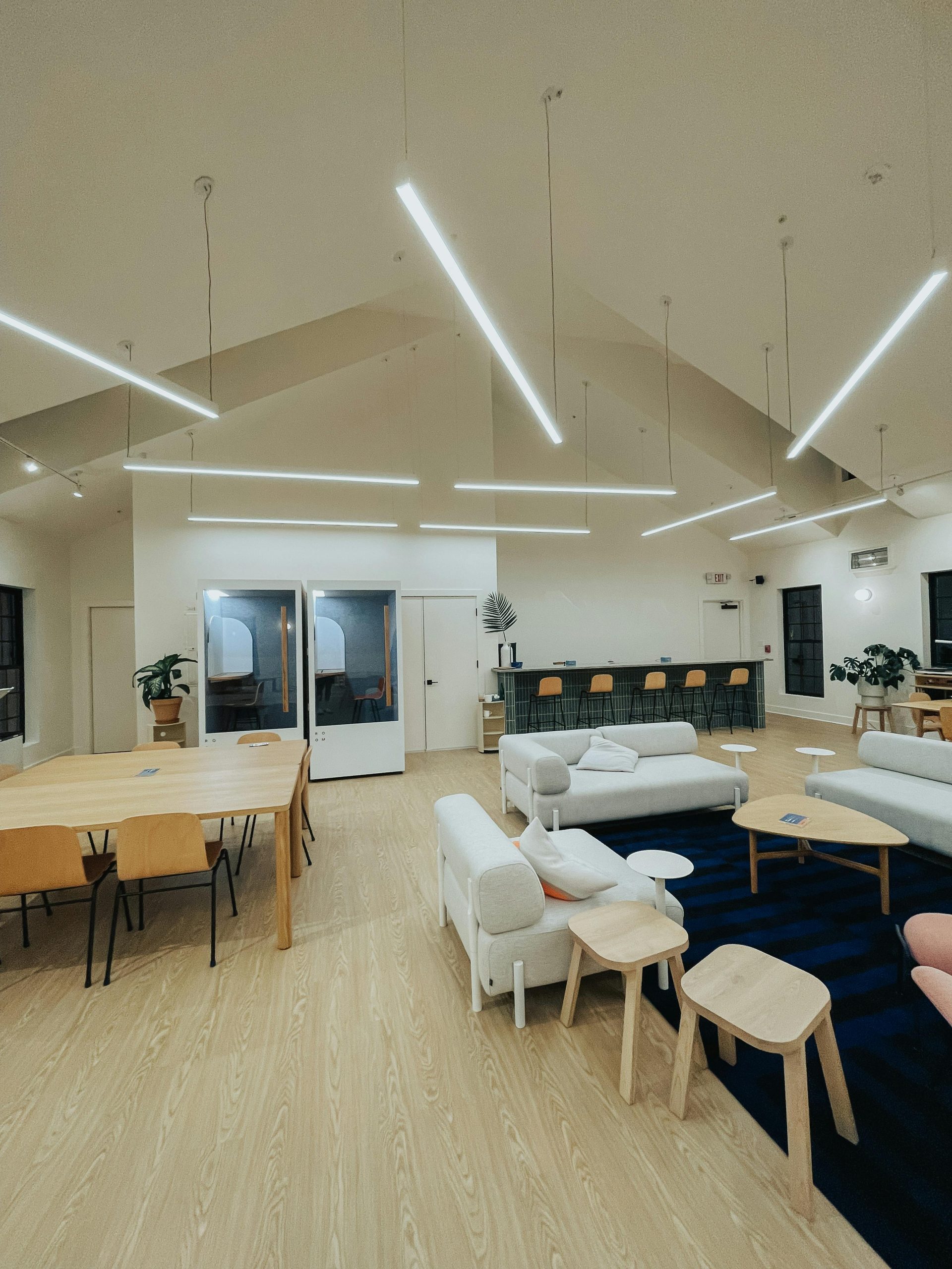 Explore this spacious, modern living room featuring sleek furnishings and a cozy interior design.