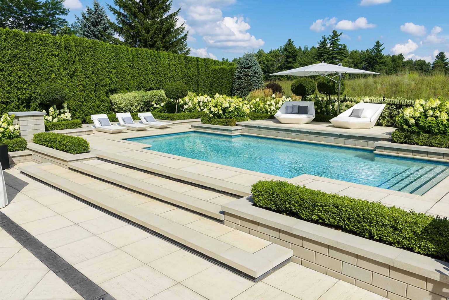 How to Design Stunning Poolside & Backyard Landscaping Spaces