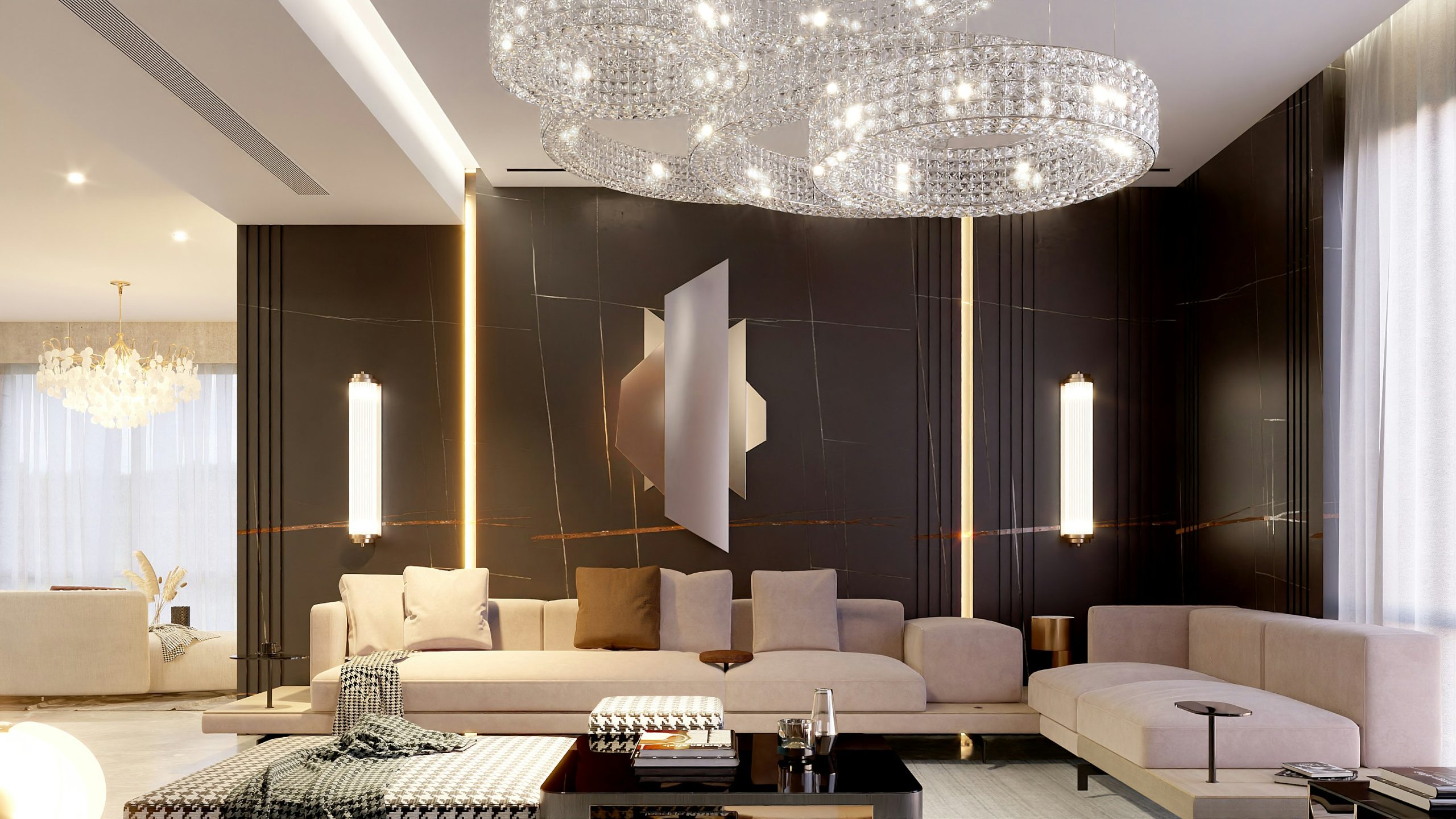 Luxurious and Modern Living Room Featuring a Stunning Crystal Chandelier, a Dark Marble Accent Wall, and a Beige Sectional Sofa