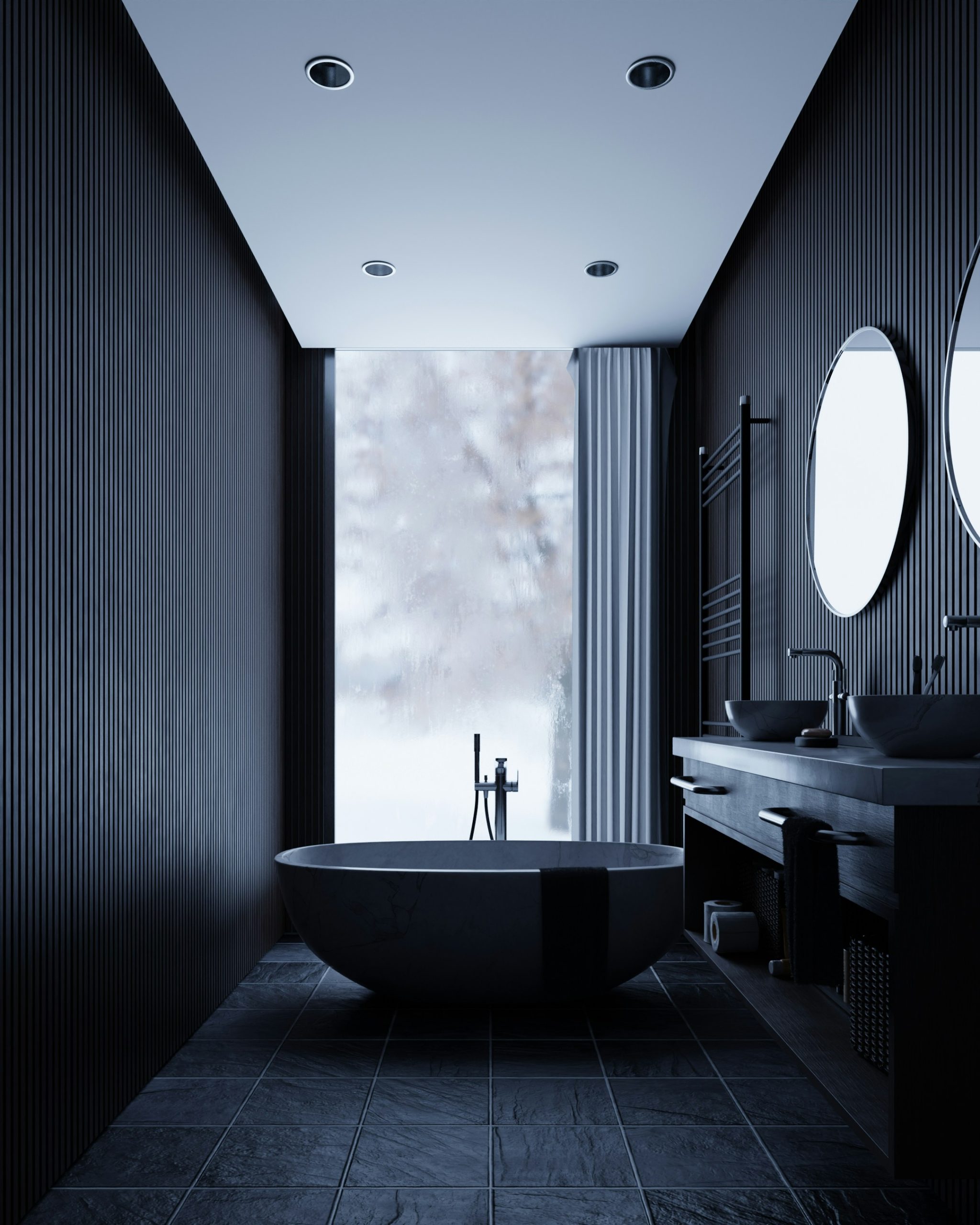 Modern dark bathroom with freestanding tub and double vanity.