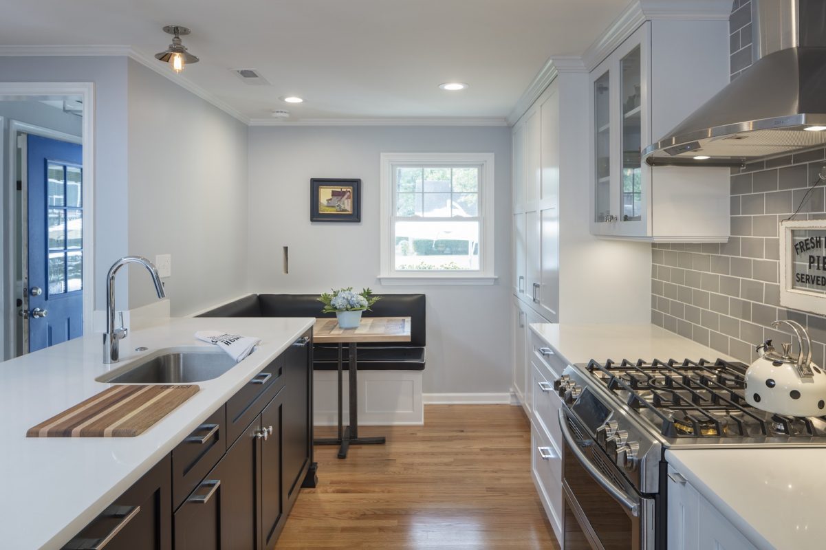 Modern Farmhouse kitchen with black island - Crystal Cabinets