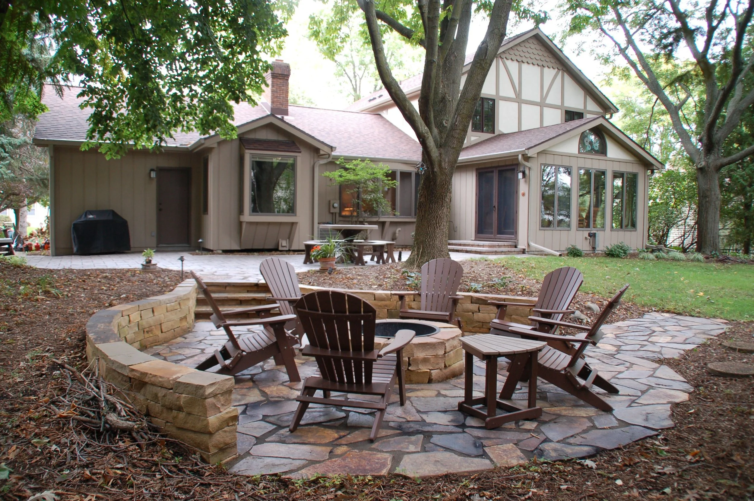 Outdoor Fireplace vs. Fire Pit: A Guide to Choosing a Fire Feature for Your Madison, WI, Landscape | Landscape Architecture, LLC