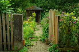Royalty-Free photo: Brown wooden gate open surrounded garden flower | PickPik