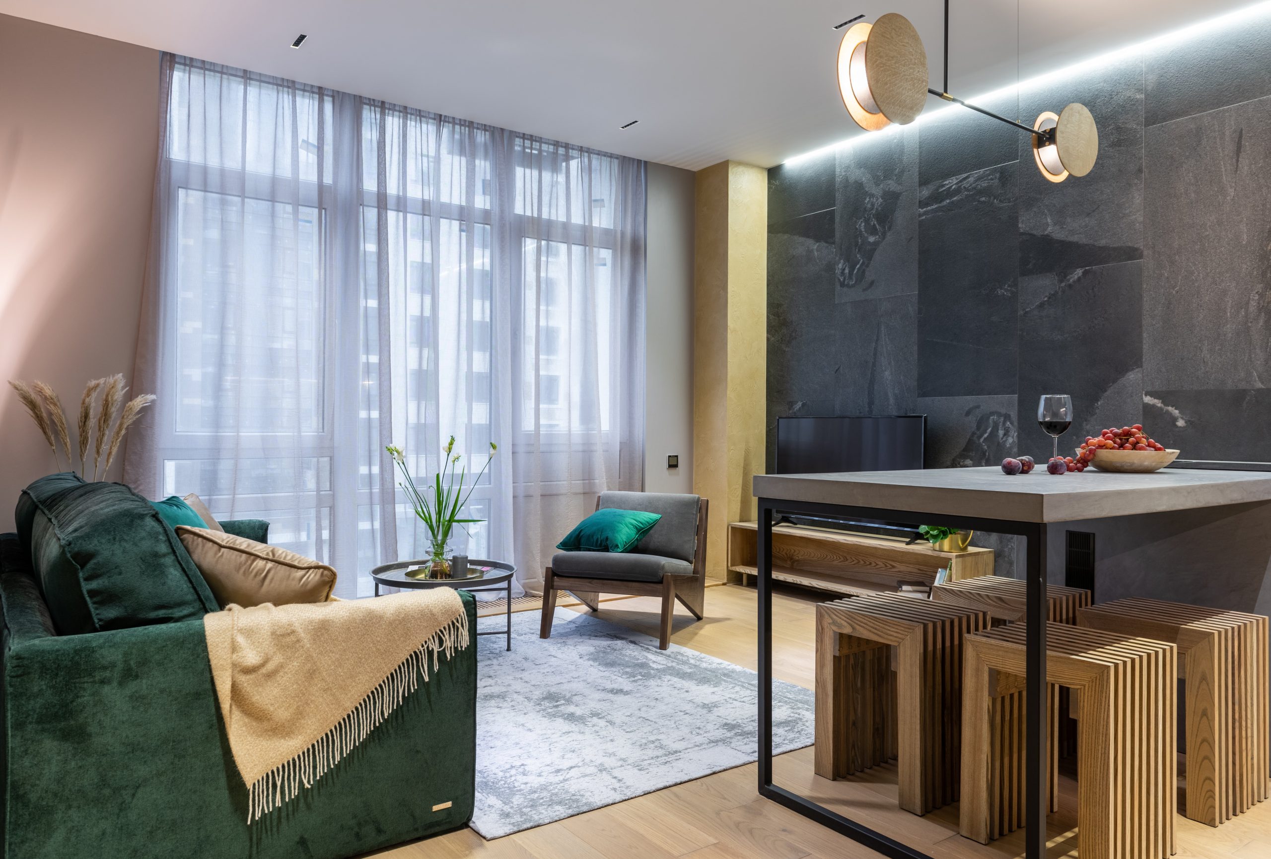 Sleek and luxurious living room with modern furnishings and elegant decor.